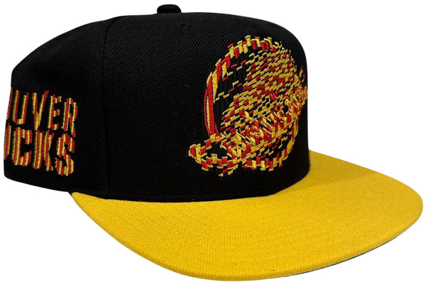 *Vancouver Canucks* snapback hats by Mitchell & Ness