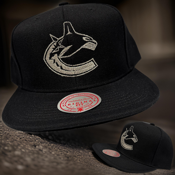 *Vancouver Canucks* (Black) snapback hats by Mitchell & Ness