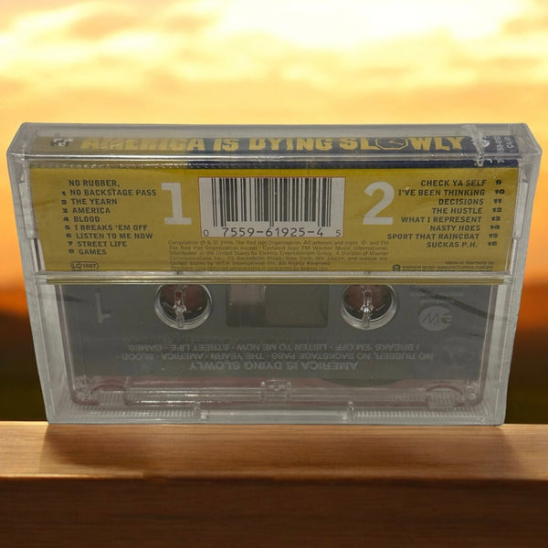 •AMERICA IS DYING SLOWLY - COMPILATION• ~1996 SEALED/SPINE CUT CASSETTE TAPE~ (EUROPE RELEASE)