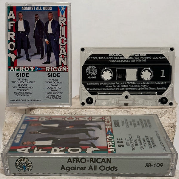 •AFRO RICAN - AGAINST ALL ODDS• ~1989 OG PRESSING~ (CASSETTE TAPE)
