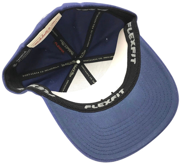 *Texas Arenas* curved beak flex fit hat by Mitchell & Ness